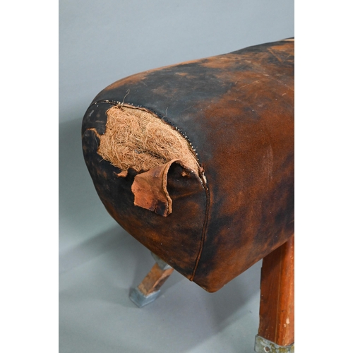 891 - A vintage vault horse, suede covered on adjustable oak legs, approx. 174 cm long