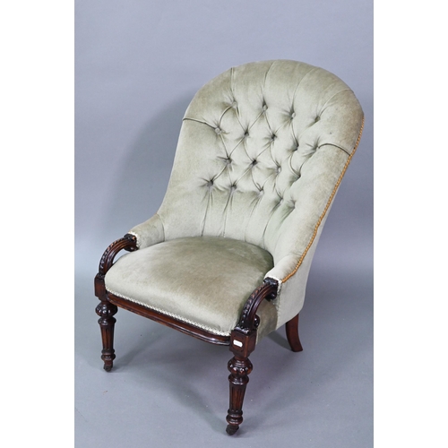 901 - A Victorian deep-buttoned green dralon nursing chair, raised on moulded turned front legs