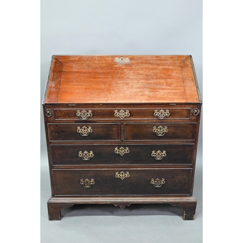 906 - A George III mahogany bureau, the fitted interior with slide top well over a dummy drawer, two short... 