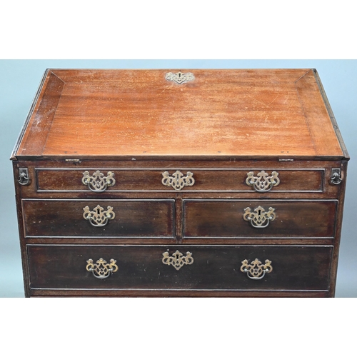 906 - A George III mahogany bureau, the fitted interior with slide top well over a dummy drawer, two short... 