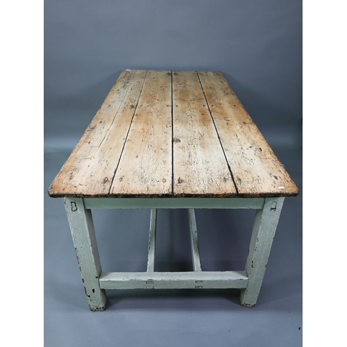 916 - An antique Irish pine 4-plank top kitchen table, the base with heavily distressed painted finish uni... 