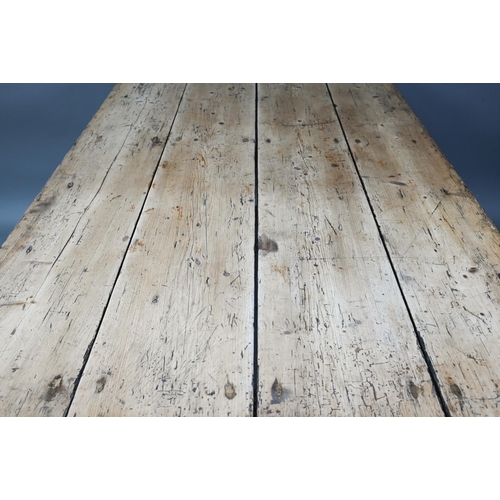 916 - An antique Irish pine 4-plank top kitchen table, the base with heavily distressed painted finish uni... 