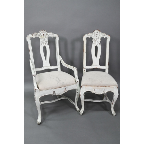 917 - A set of seven French dining chairs in distress painted finish, with fabric seats comprising six sid... 