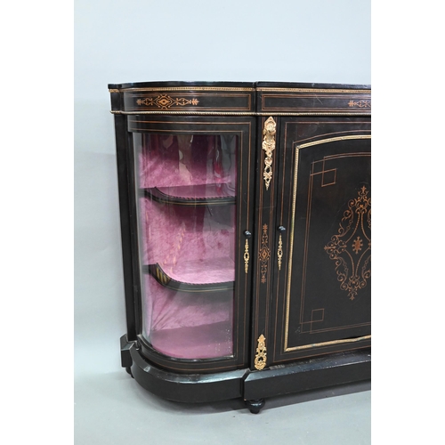 918 - A Victorian gilt metal mounted ebonised credenza, the gilt stencilled centre cabinet door flanked by... 