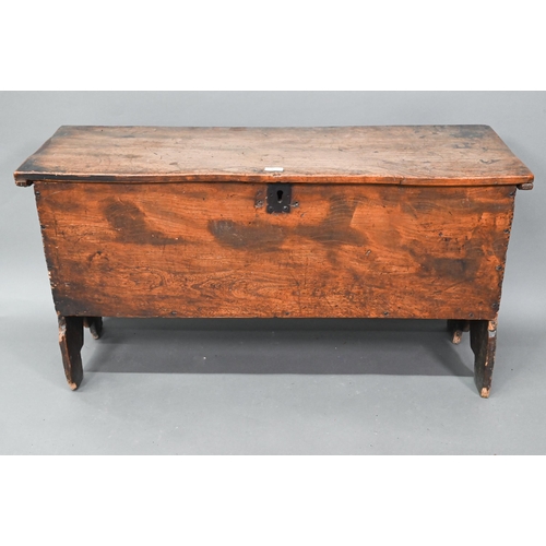 923 - A 17th century elm six-plank coffer, raised on 'V' cut ends, 120 cm w x 40 cm x 56 cm h