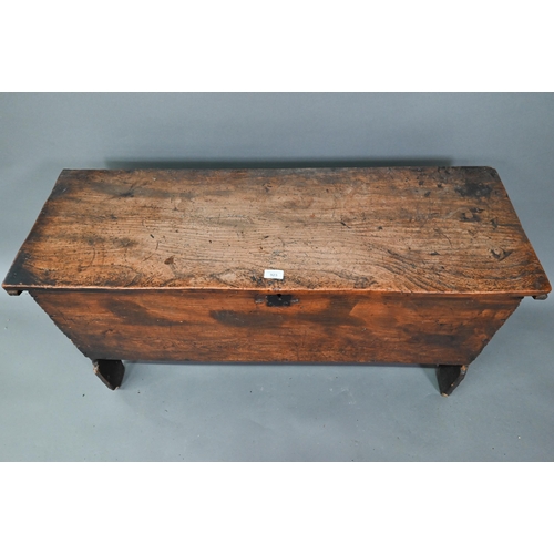 923 - A 17th century elm six-plank coffer, raised on 'V' cut ends, 120 cm w x 40 cm x 56 cm h