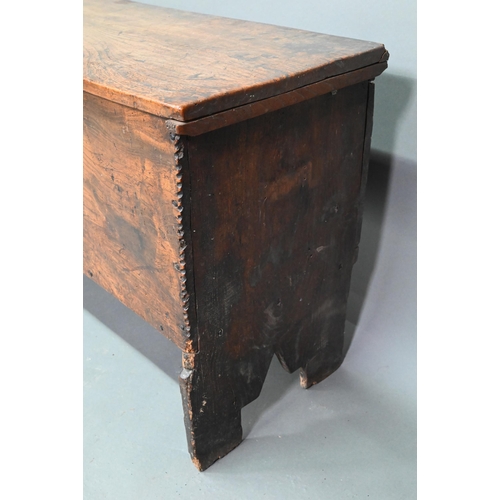 923 - A 17th century elm six-plank coffer, raised on 'V' cut ends, 120 cm w x 40 cm x 56 cm h