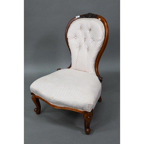 927 - Two late Victorian walnut framed button backed salon chairs, an open salon armchair and a nursing ch... 