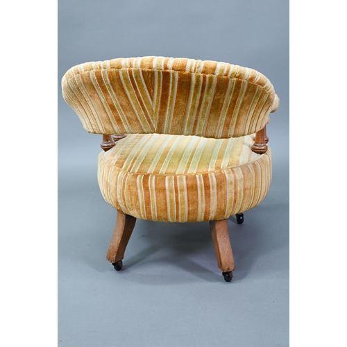 930 - A late 19th century yellow fabric upholstered crinoline form salon chair, on castors