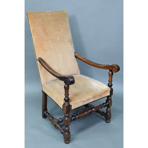 932 - An 18th century walnut open framed and upholstered high back armchair, on a part turned H stretcher ... 