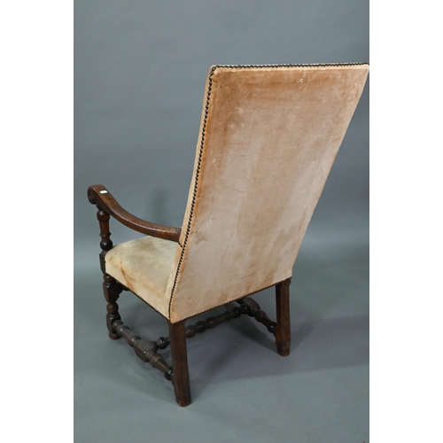 932 - An 18th century walnut open framed and upholstered high back armchair, on a part turned H stretcher ... 