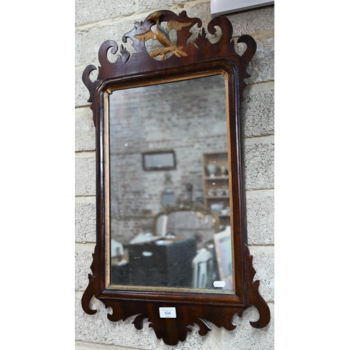 934 - Two antique fret framed mirrors, one with gilt ho-ho bird surmount, 73 cm x 44 cm (2)