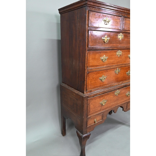 939 - A George II oak chest on stand comprised of two short over three long graduated drawers, over a furt... 