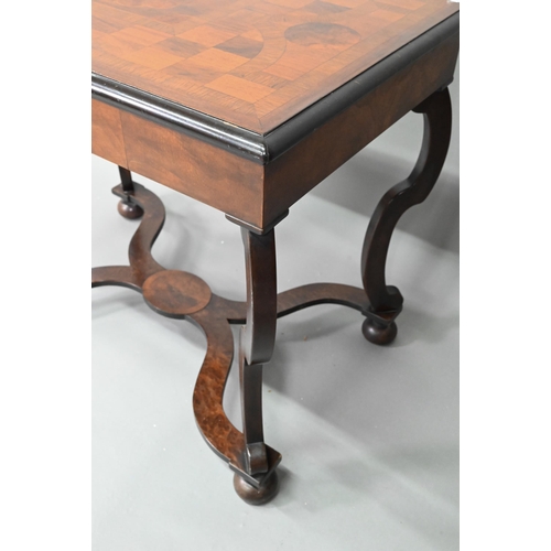 941 - An 18th century style specimen timber inlaid centre table, raised on scroll legs united by a conform... 