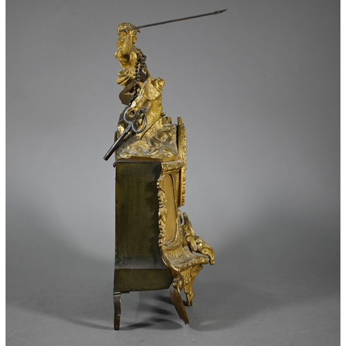 943 - A 19th century ormolu 8-day mantel clock, surmounted by a spear wielding warrior with white enamelle... 