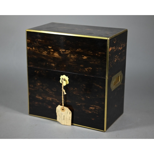 957 - A 19th century Betjeman's brass mounted Coromandel decanter box, with flush handles, the interior fi... 