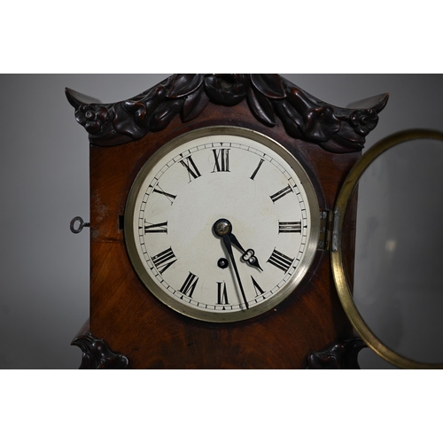 962 - A mid 19th century single fuse mahogany cased English bracket clock, with white enamelled dial and a... 