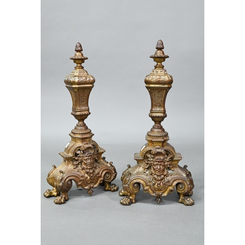 963 - A pair antique cast brass fire dogs, 60 cm h, on iron bracket legs