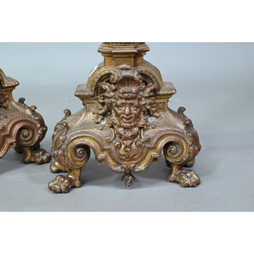 963 - A pair antique cast brass fire dogs, 60 cm h, on iron bracket legs