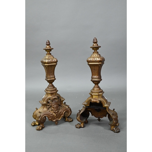 963 - A pair antique cast brass fire dogs, 60 cm h, on iron bracket legs