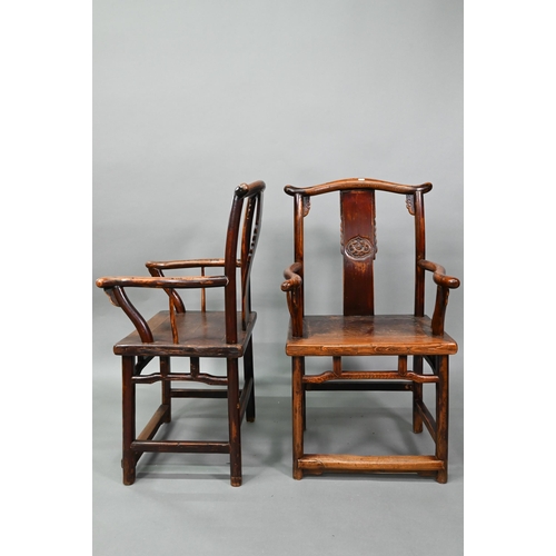 965 - A pair of Chinese elm 'official's hat' wedding chairs in the Ming dynasty manner, the shaped backres... 