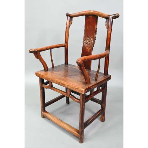 965 - A pair of Chinese elm 'official's hat' wedding chairs in the Ming dynasty manner, the shaped backres... 