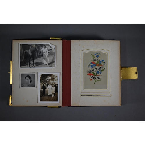 1020 - A small Victorian morocco-bound postcard album with gilt brass corners and clasp a/f, containing mos... 