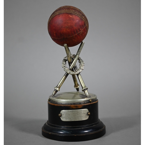 1045 - Cricket: an EPNS trophy modelled as three wreathed stumps to support a leather cricket ball, an ebon... 