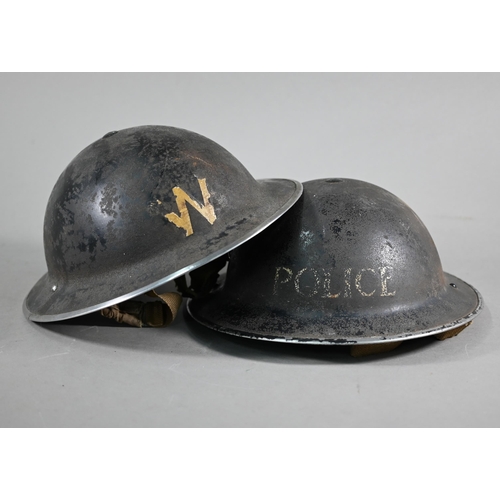 1060 - A WWII Police helmet, the original painted finish stencilled 'POLICE' c/with liner and chin strap to... 