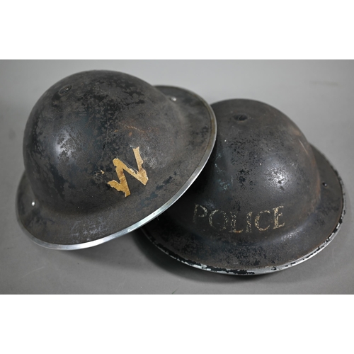 1060 - A WWII Police helmet, the original painted finish stencilled 'POLICE' c/with liner and chin strap to... 