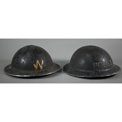 1060 - A WWII Police helmet, the original painted finish stencilled 'POLICE' c/with liner and chin strap to... 