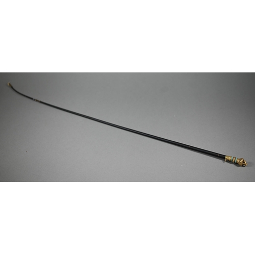 1076 - A Victorian riding crop, the gilt metal pommel surmounted by two lurchers and inset with turquoise b... 