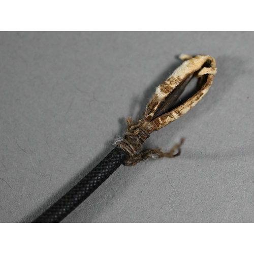 1076 - A Victorian riding crop, the gilt metal pommel surmounted by two lurchers and inset with turquoise b... 