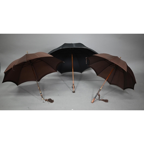 1089 - A lady's vintage umbrella by Kendal, with brown silk canopy on rosewood handle with gilt metal mount... 