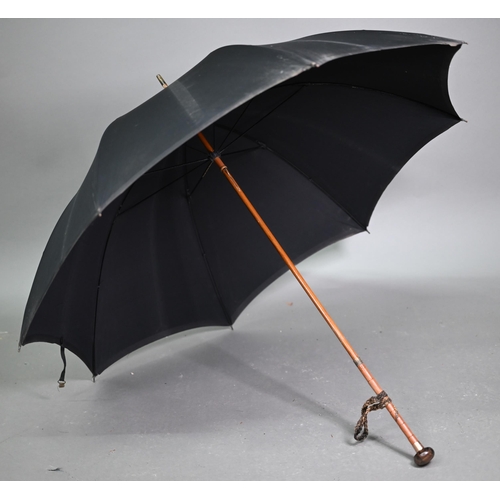 1089 - A lady's vintage umbrella by Kendal, with brown silk canopy on rosewood handle with gilt metal mount... 