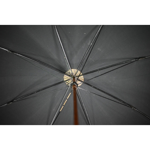 1089 - A lady's vintage umbrella by Kendal, with brown silk canopy on rosewood handle with gilt metal mount... 