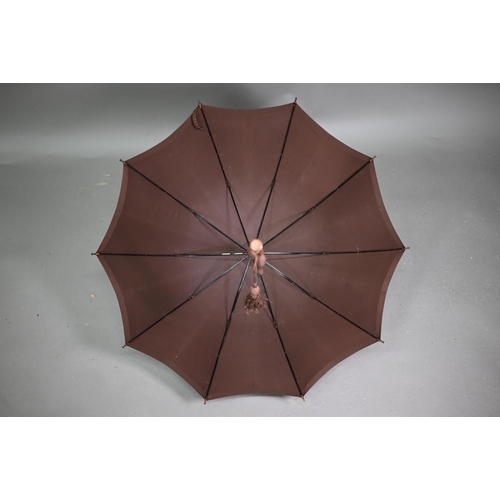 1089 - A lady's vintage umbrella by Kendal, with brown silk canopy on rosewood handle with gilt metal mount... 