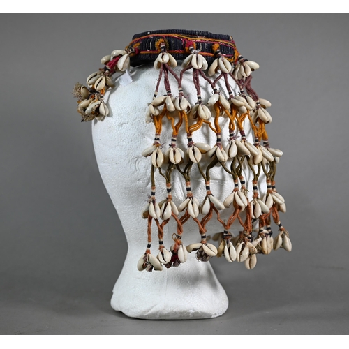 1091 - An African cowry-shell headdress or veil, bound with coloured threads