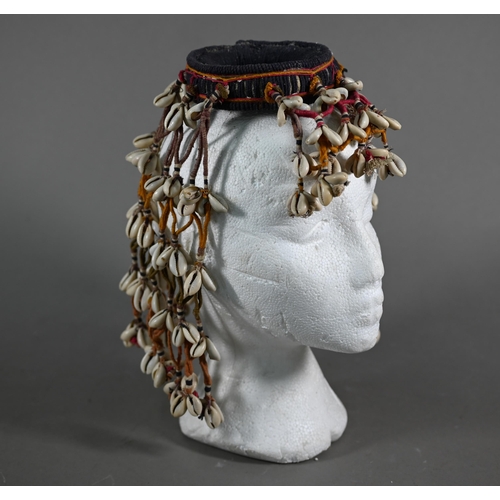 1091 - An African cowry-shell headdress or veil, bound with coloured threads