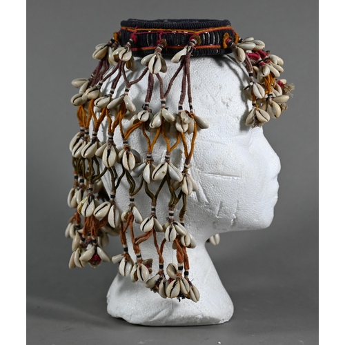 1091 - An African cowry-shell headdress or veil, bound with coloured threads