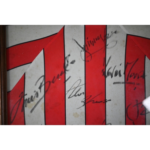 1105 - A Southampton FC football shirt, signed by the team, circa 1990, including Alan Shearer, Kevin Moore... 