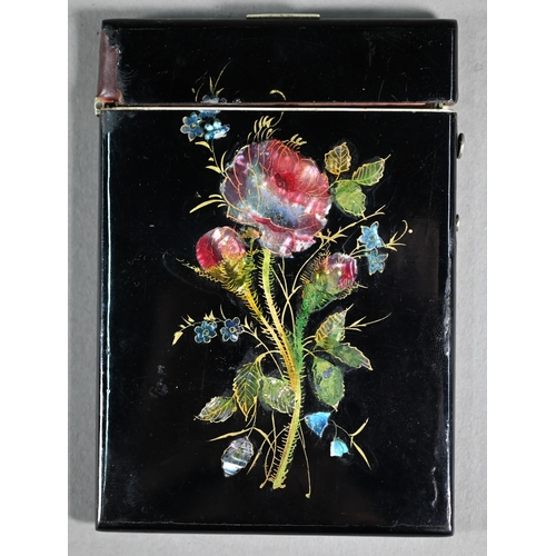 1108 - A Victorian papier-maché visiting card case with painted, gilded and mother-of-pearl inlaid decorati... 