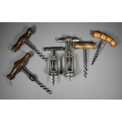 1113 - Six various antique corkscrews, including a Solon open-barrel example, another open barrel with flip... 