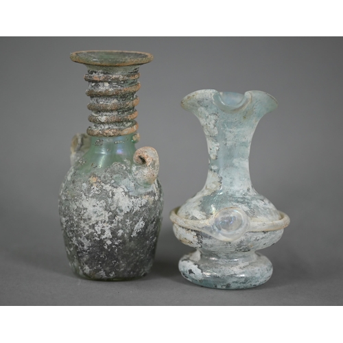 1160 - Two small Roman glass two-handled vessels, 11 and 9 cm high