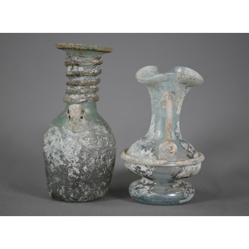 1160 - Two small Roman glass two-handled vessels, 11 and 9 cm high