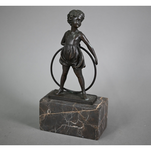 1200 - After Ferdinand Preis, a reproduction brown bronze figure of a girl with hoop, signed to base, 26 cm... 