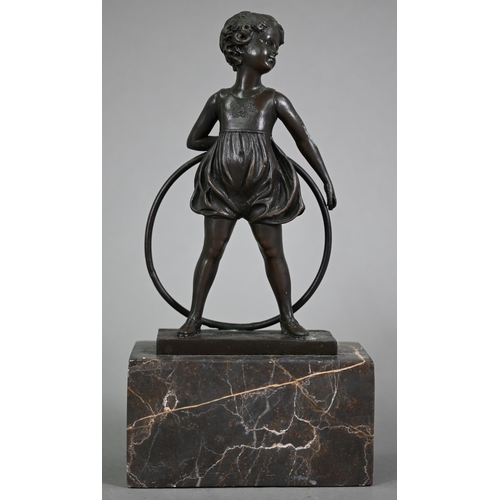 1200 - After Ferdinand Preis, a reproduction brown bronze figure of a girl with hoop, signed to base, 26 cm... 