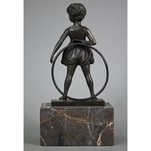 1200 - After Ferdinand Preis, a reproduction brown bronze figure of a girl with hoop, signed to base, 26 cm... 