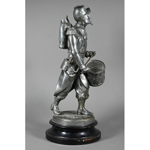 1202 - After Emille Guillemin, a late 19th century French silver patinated spelter figure of a drummer of t... 