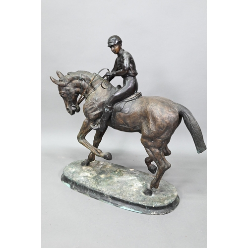 1205 - After Pierre Jules Menes, a patinated bronze sculpture of a mounted jockey, raised on a naturalistic... 